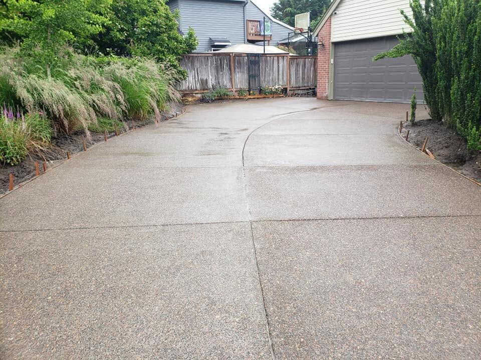 Newly poured concrete driveway by Zuber Concrete