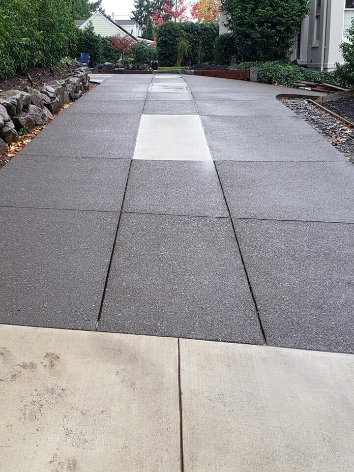 Exposed aggregate concrete driveway by Zuber Concrete