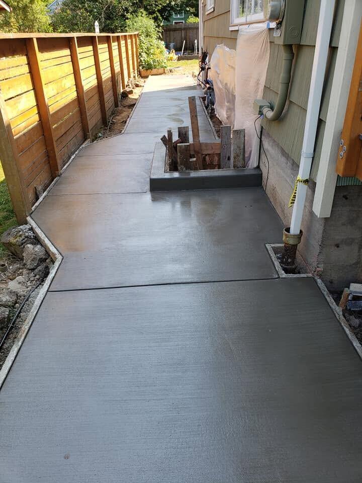 Concrete walkway installation by Zuber Concrete
